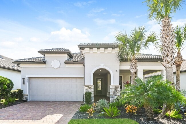 Building Photo - Luxury Turnkey 3BR + Den / 3BA Pool Home in Greyhawk at Golf Club of the Everglades