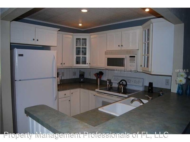 Building Photo - 12000 Capri Cir S