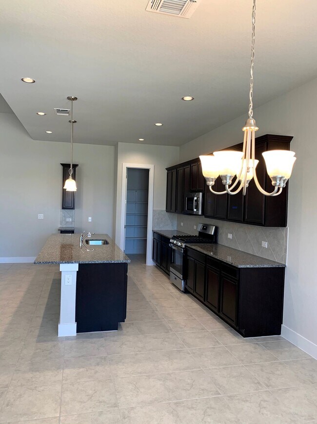Building Photo - 10717 Charger Wy