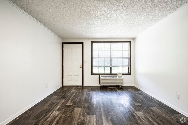 1BR, 1BA - 576SF -Living room - Camellia Court Apartments