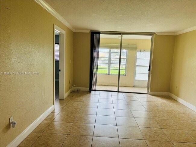 Building Photo - 8110 Sunrise Lakes Blvd