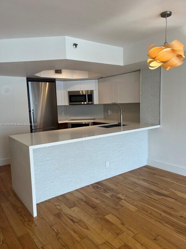 Building Photo - 8911 Collins Ave