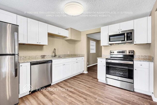 Building Photo - 6968 Delisle Dr