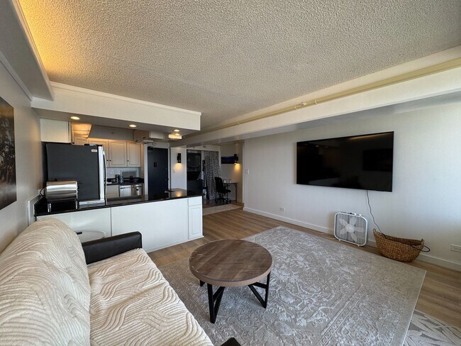 Building Photo - Available 03/01/2026. Fully-furnished, high-floor, mountain views, amenities!