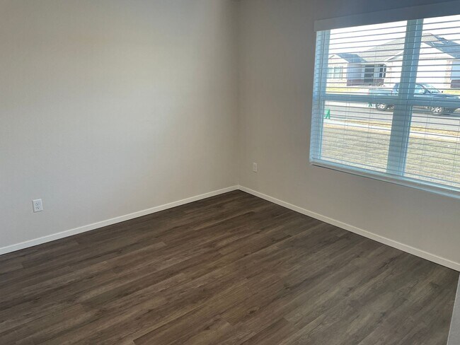 Building Photo - *New Year, New Home Special* BRAND NEW Thr...