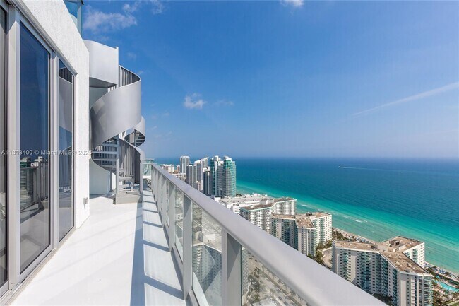 Building Photo - 4010 S Ocean Dr