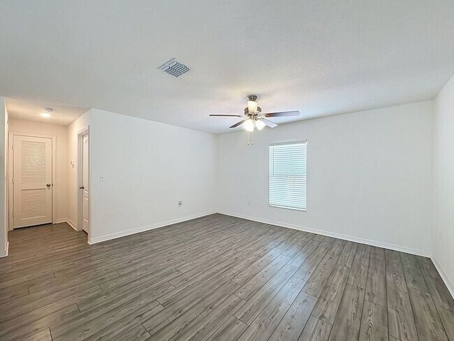 Building Photo - Spacious Open-Concept Living with Modern Finishes in Villate 7 Poinciana