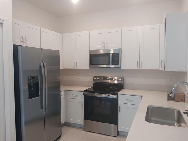 Building Photo - 8607 Tropical Aire Ln