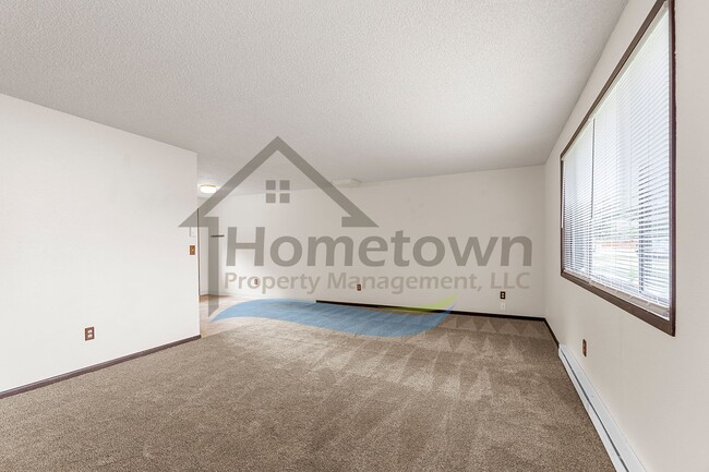 Building Photo - 3 Bedroom 2 Bathroom Home with Attached Ga...