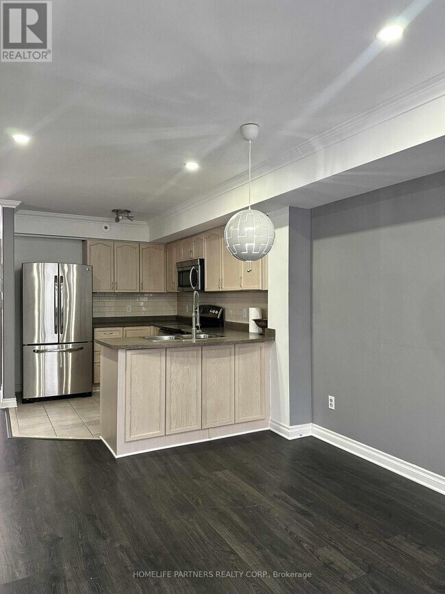 Photo du bâtiment - 605-605 Shoreline Dr