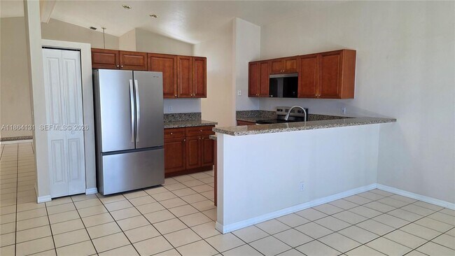 Foto del edificio - 3406 SW Coco Palm Dr