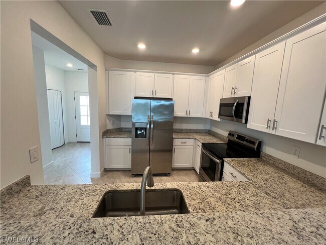 Foto del edificio - 14160 Pine Lodge Ln