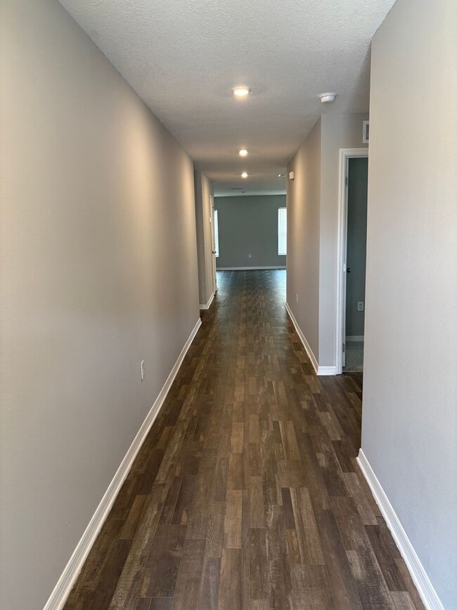 Building Photo - Beautiful 4-Bedroom Corner-Lot Home in Poinciana with 2-Car Garage