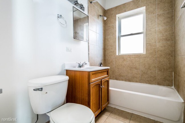 Building Photo - 1 br, 1 bath Apartment - 6230 S Artesian Ave