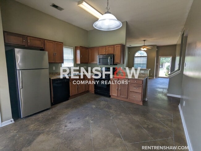 Building Photo - 6817 Kamali Ave.  - Lovely Home on Corner ...