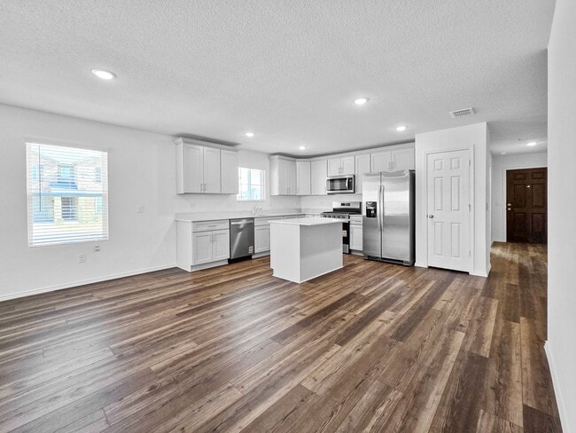 Foto del edificio - Brand New 4BR 3BA Home w/ Quartz Kitchen • 2-Car Garage • Fenced Yard in Elizabeth Creek