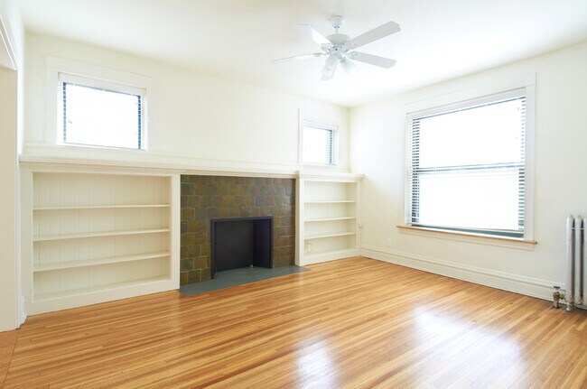 Built In Book Shelves, Decorative Fireplace, Natural Light, Hardwood Flooring - 2815 N Mildred Ave