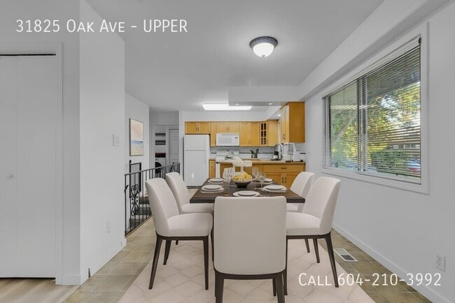 Building Photo - Bright Upper Suite