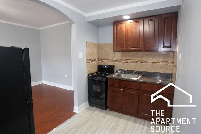 Foto del edificio - 6930 N Greenview Ave