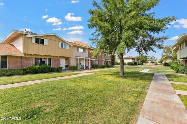 Building Photo - 8447 E Montebello Ave