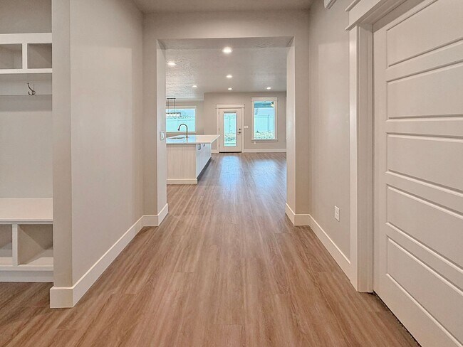 Building Photo - Brand New 4-Bedroom Home in Pheasant Meadows with 3-Car Garage Near Shopping and Dining