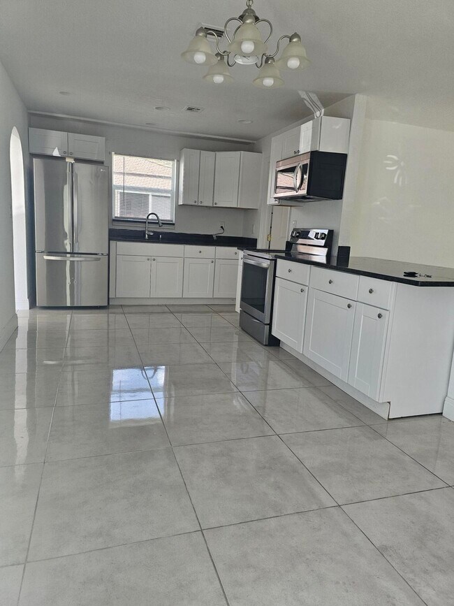 Foto del edificio - 1142 W 23rd St