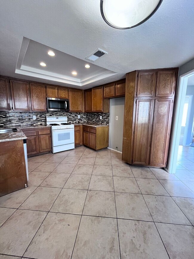 Building Photo - Grand Terrace Townhouse in Gated Community with NEW Paint & NEW Carpet