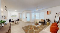 Located in Phoenix, AZ, this single-story, 2-bedroom, 3-bathroom home offers a clean, modern aesthetic throughout. Light wood-style flooring flows seamlessly across the entire layout, complementing the crisp white walls and creating a bright, cohesive atmosphere.

The living room is bathed in natural light from multiple windows fitted with white horizontal blinds and features a ceiling fan, a glass-panel entry door, and direct access to a private outdoor patio — an ideal space for relaxing in the Arizona sunshine.

The kitchen is thoughtfully designed with white shaker cabinetry, black hardware, white quartz countertops, a geometric tile backsplash, and a full suite of stainless steel appliances including a gas range and built-in microwave.

Both bedrooms are well-proportioned and serene, with the spacious primary bedroom offering ample room to furnish comfortably. All three bathrooms are finished in a consistent modern style, featuring white vanities, black hardware accents, square-framed mirrors, and tub/shower combinations.

Additional highlights include a dedicated in-unit laundry room with side-by-side washer and dryer, overhead shelving, and a closet for added storage. The home's single-floor layout ensures ease of movement throughout the space.