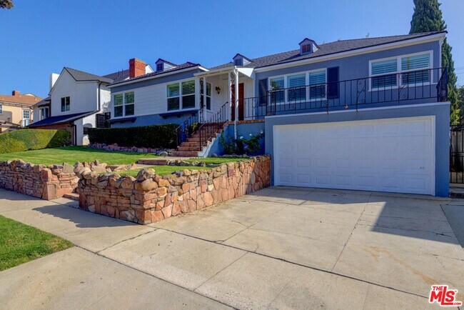 Building Photo - 5572 Bradna Dr