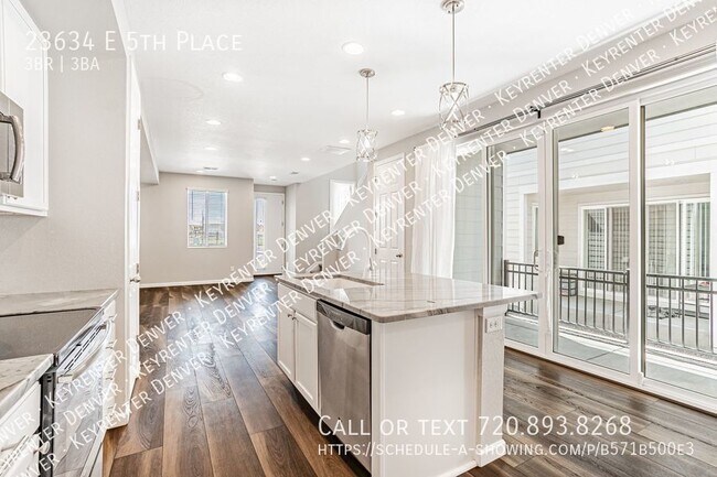 Building Photo - Luxury Living in Aurora: Your Dream Townho...