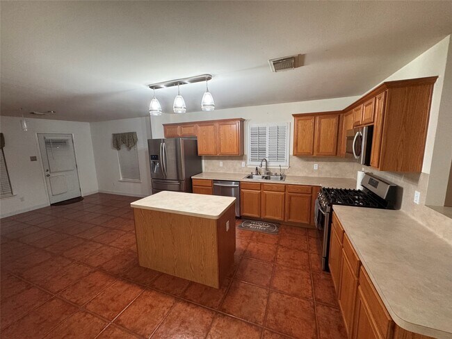 Foto del edificio - 7623 Village Mill Ln