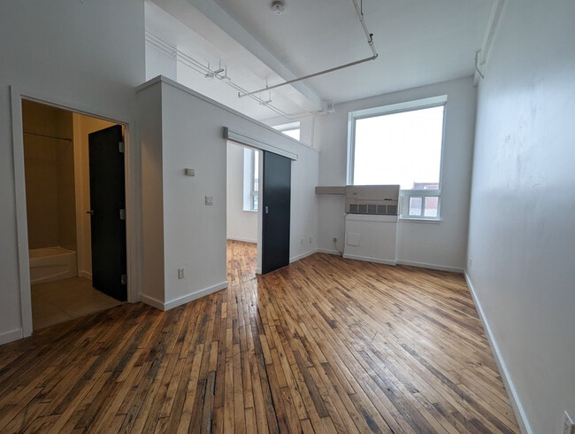 Building Photo - Huge 1-plus-den at Tiger Lofts