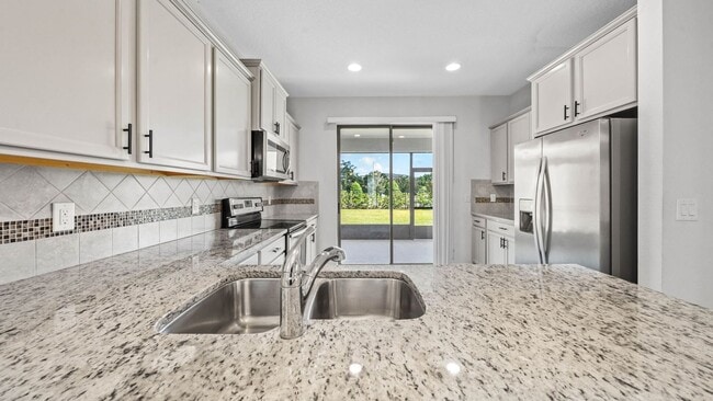 Building Photo - Spacious Gated-Community Home w/ Modern Up...