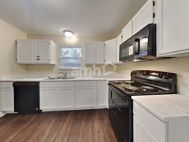 Foto del edificio - 5568 Alcott Ln