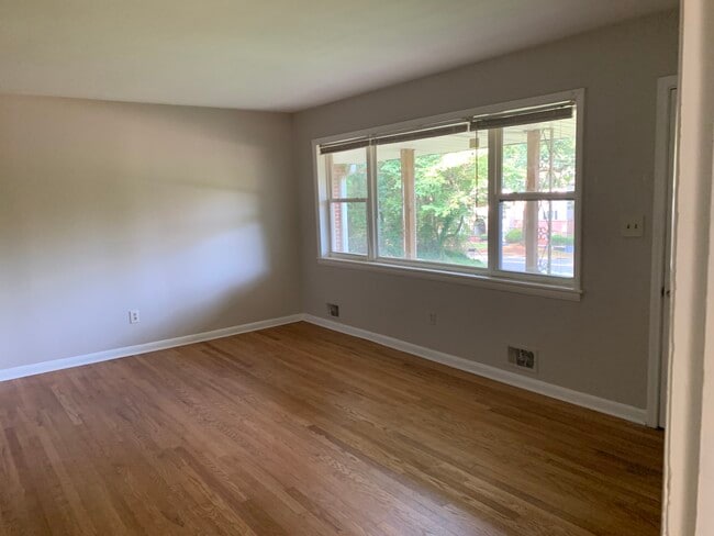 Sun-filled front room for entertaining. - 561 Northern Ave