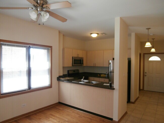 Foto del edificio - 4955 N Damen Ave