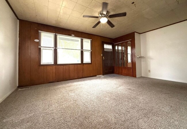 Photo - Cozy Main-Floor Living with Garage & Yard House