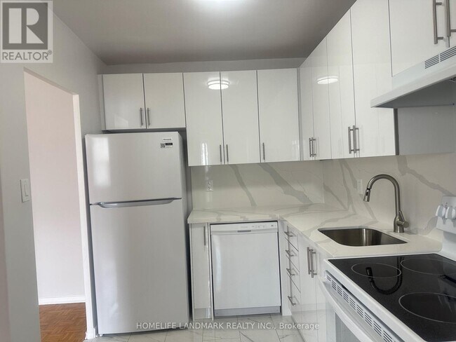 Photo du bâtiment - 65 N Service Rd