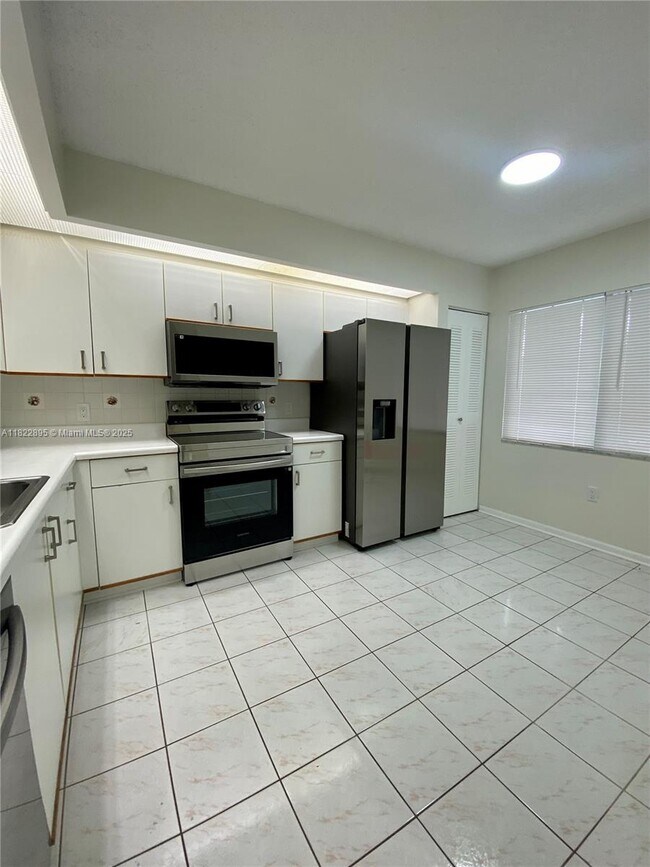 Building Photo - 1301 SW 142nd Ave