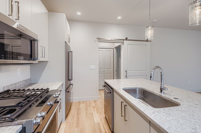 Building Photo - New Luxury 1BR – Lives Like Private Townho...