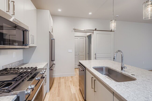 Building Photo - NOT Your Typical 1BR – New, Private Garage...