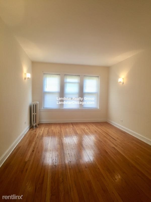 Building Photo - 5058 N Wolcott Ave