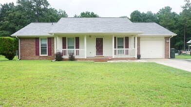 Building Photo - 7574 Beverly Dr