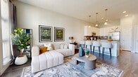 Located at 101 E Fourth St in Newport, Kentucky, this well-appointed one-bedroom, one-bathroom residence offers a thoughtfully designed open-concept floor plan. The combined kitchen and living area serves as the heart of the home, highlighted by rich hardwood-style flooring, recessed lighting, and large sliding glass doors that flood the space with natural light and provide views of the outdoors. The kitchen is outfitted with crisp white cabinetry, grey subway tile backsplash, granite-style countertops, stainless steel appliances, and a peninsula with bar seating — ideal for casual dining or entertaining. A separate dining area offers additional space for meals and gatherings. The living room is open and inviting, anchored by a generous layout that flows seamlessly from the kitchen. The primary bedroom features plush carpeting, a bold teal accent wall, and windows that bring in natural light, along with convenient access to the full bathroom. The bathroom is finished with a glass-enclosed walk-in shower clad in grey tile, a white vanity with granite countertops, and hardwood-style flooring. Two closets provide ample storage throughout. The entrance welcomes residents with a clean, modern aesthetic that carries through every room of this stylish Newport residence.