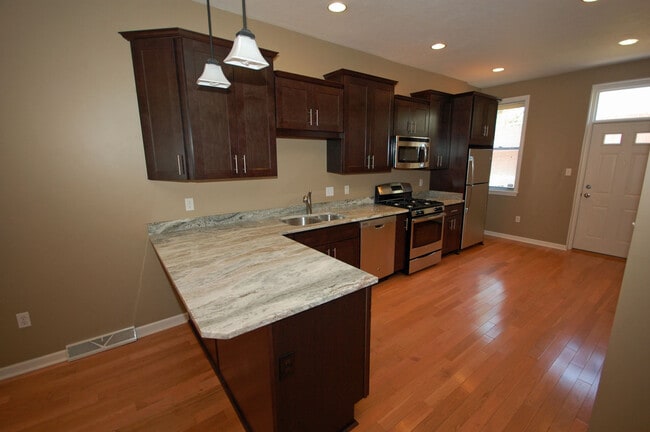 Custom cabinets w/granite countertop (Paint colors being updated to Shoji White_ - 5827 Pierce St