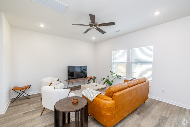 3BR, 2.5BA - 1,528SF - Living Room - Flyway Meadows