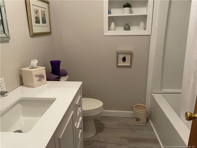 Foto del edificio - 3-Bedroom 1.5-bath brick home