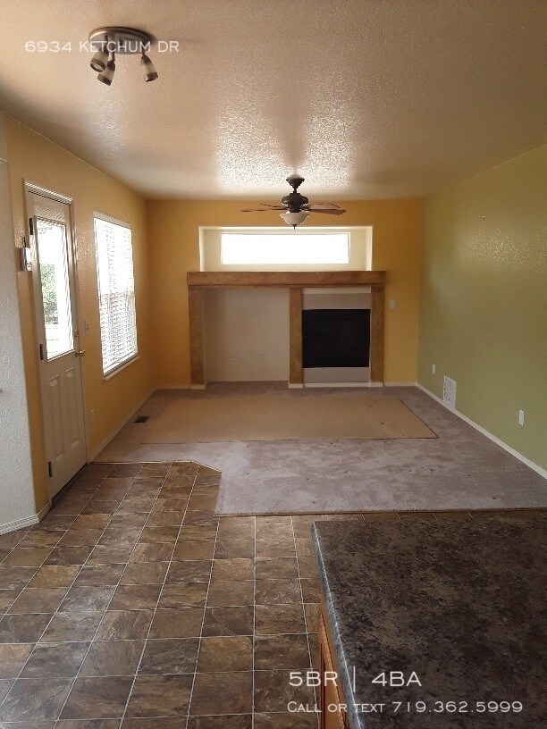 Building Photo - This 5-bedroom home is like-new!