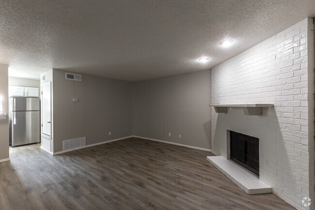 2BR, 1.5BA - 1,120SF - Living Room - Country Crest Townhomes