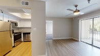 This single-floor unit presents a thoughtfully designed open-concept layout with neutral warm-gray walls and clean white trim throughout. The living area features light hardwood-style flooring and a ceiling fan, with a large sliding glass door fitted with vertical blinds that allows natural light to fill the space and provides outdoor access.

The kitchen is efficiently laid out with white cabinetry, granite countertops, and a full suite of stainless steel appliances, including a refrigerator, microwave, range, and dishwasher. A tray ceiling detail adds architectural interest overhead. The kitchen connects seamlessly to the living space via a pass-through counter opening, enhancing the open feel of the unit.

The bedroom is carpeted and comfortably proportioned, featuring a ceiling fan and a window with blinds that brings in natural light and exterior views. It connects directly to the full bathroom, which is finished with a granite-topped vanity, white cabinetry, a tub-shower combination with tiled surround, and hardwood-style flooring. The overall ambiance of the unit is clean, modern, and move-in ready, with consistent finishes creating a cohesive, functional living environment.